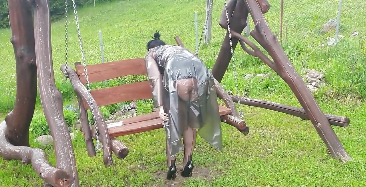 Behold my new style - a "Mac" transparent raincoat along with open-nipples bra and havana heel genuine nylon stockings
