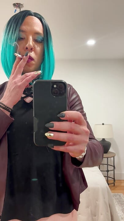 Green haired smoking femboy