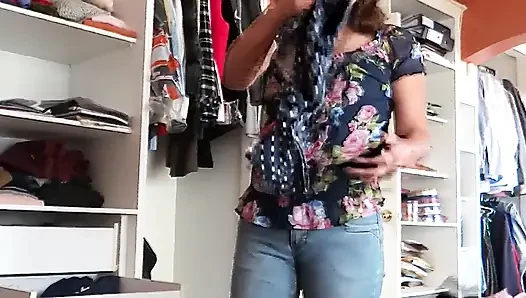 My stepmother tries on jeans while I masturbate, admiring her big ass and hairy pussy.