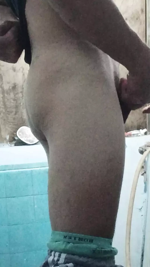Big dick again pissing in the bathroom