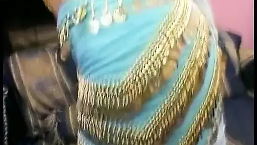 Lusty brunette dressed in Indian Style seduces two horny dudes