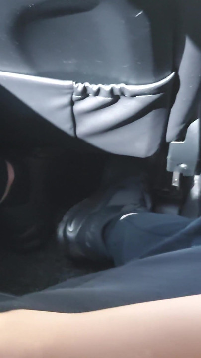Elegant stepmom in stockings teases her stepson in the car, in public, and rubs his cock with her feet | Clip 1