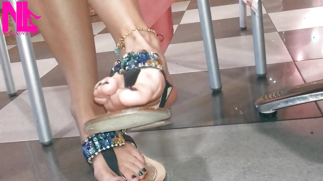 Dangling and Shoeplaying in a Bar with My Blue Estrada' Flip Flops