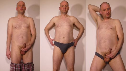 Kudoslong in shorts stößt seinen erigierten schwanz, dann in shorts und nackt seinen haarigen, unbeschnittenen penis