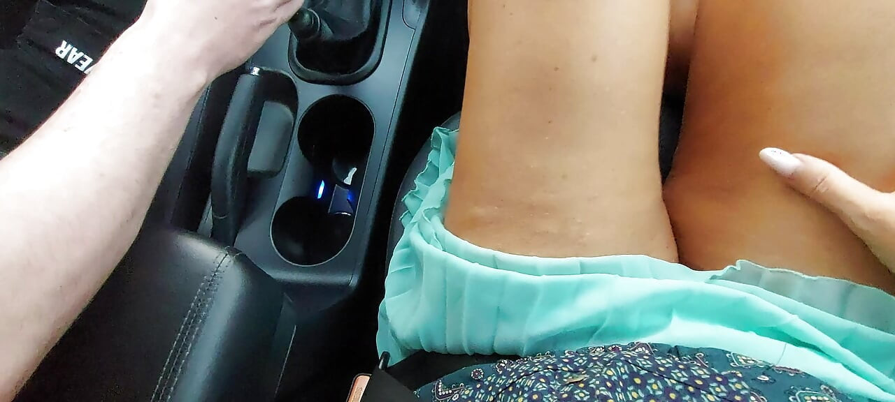 Mature aunt teases her stepson with her sexy legs in the car.