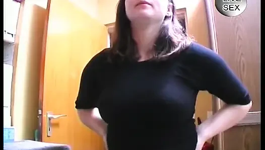 Big boobed brunette fingering pussy before giving a blowjob