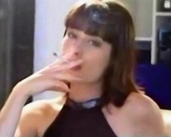 Woman Relaxes with a Smoke