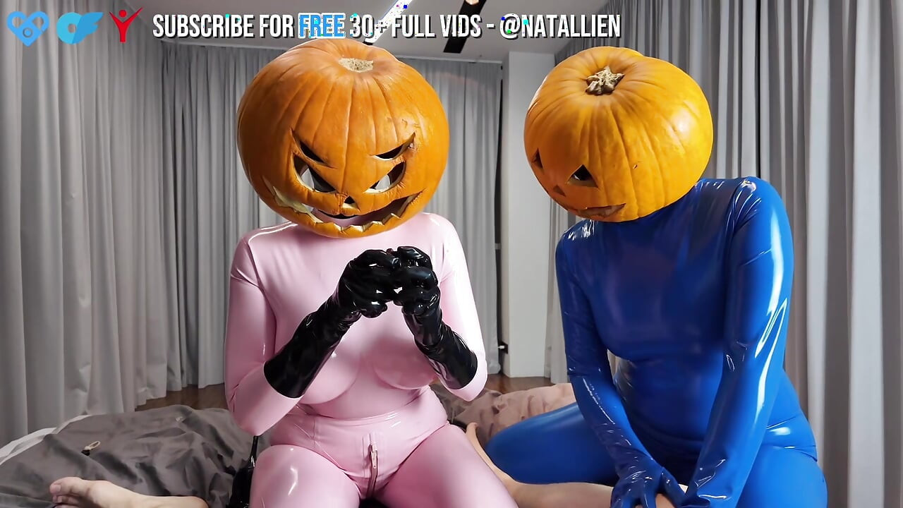 Two Latex Pumpkin Mistresses Tease Their Sub Before Locking Him in Chastity