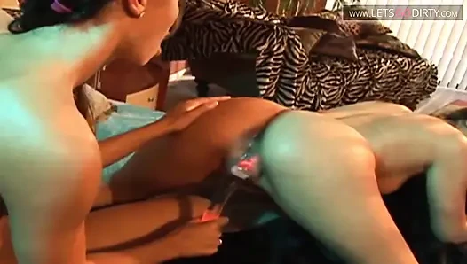 Sexy babe moans in pleasure as her pussy is fucked with a huge dildo