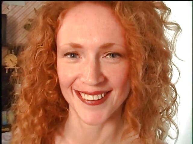 Playful redhead  gives sensual blowjob
