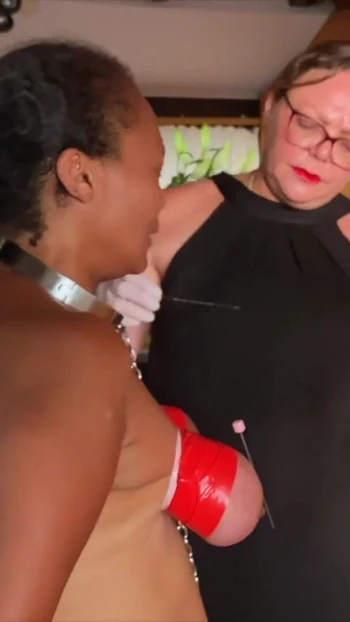 Jaw-dropping moment from "Dominatrix Mistress April  Rose in the garden 2 - ebony female slave training"