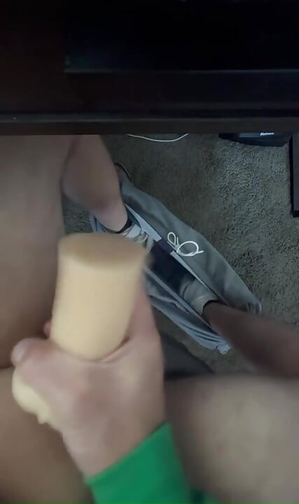Playing with the Toy Under the Office Desk