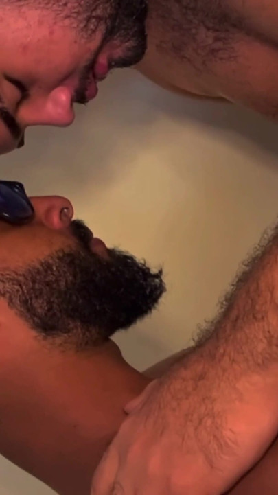 A Big Gay Guy with Huge Nipples and a Black Guy with a Big Cock Share an Intense and Babble-kissed Kiss.