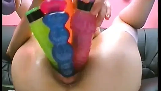 Stockinged brunette whore moaning while drilling her pussy