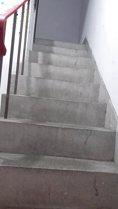 Shemale Ting xuan masturbates with a vibrator inserted in the stairwell.