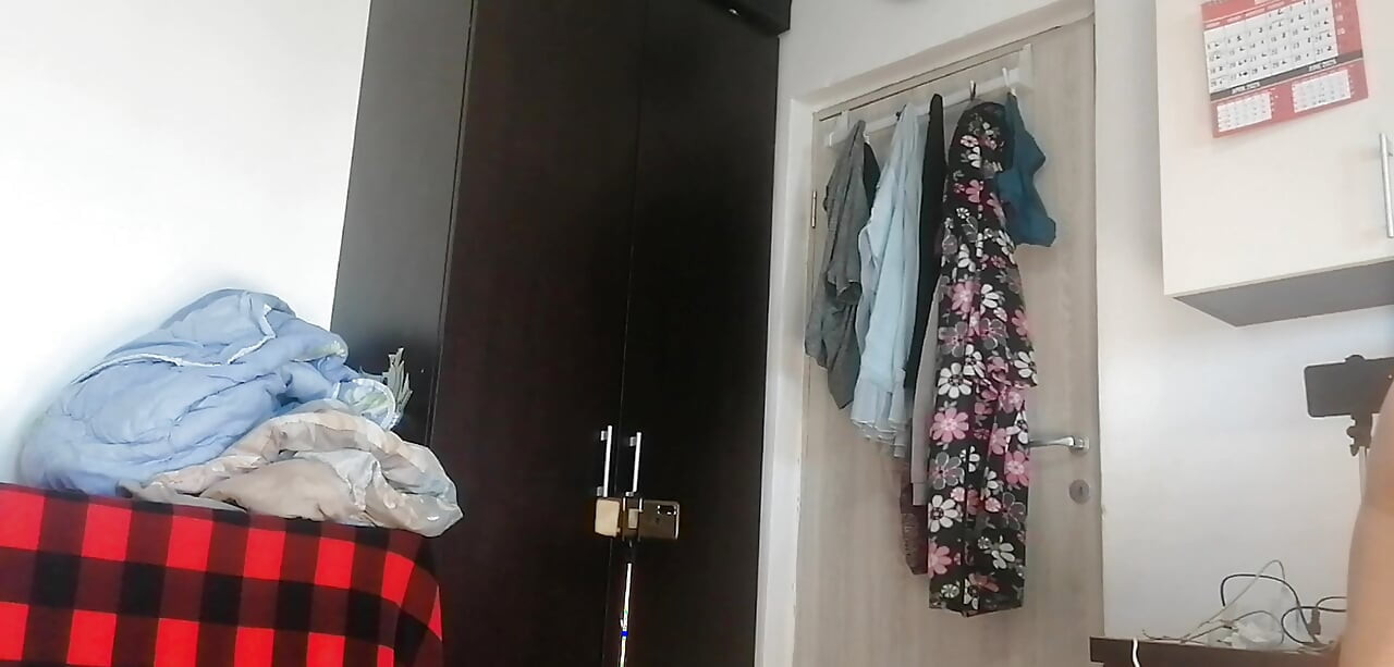 Sexy Latina Having Fun Trying on Clothes and Cutting Them