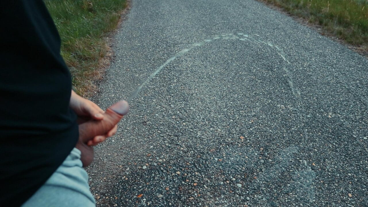 Pissing with a bare cock in nature