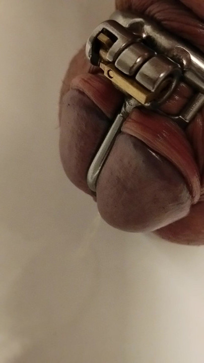 pissing with cage