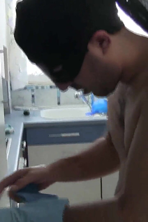 Cleaning her kitchen