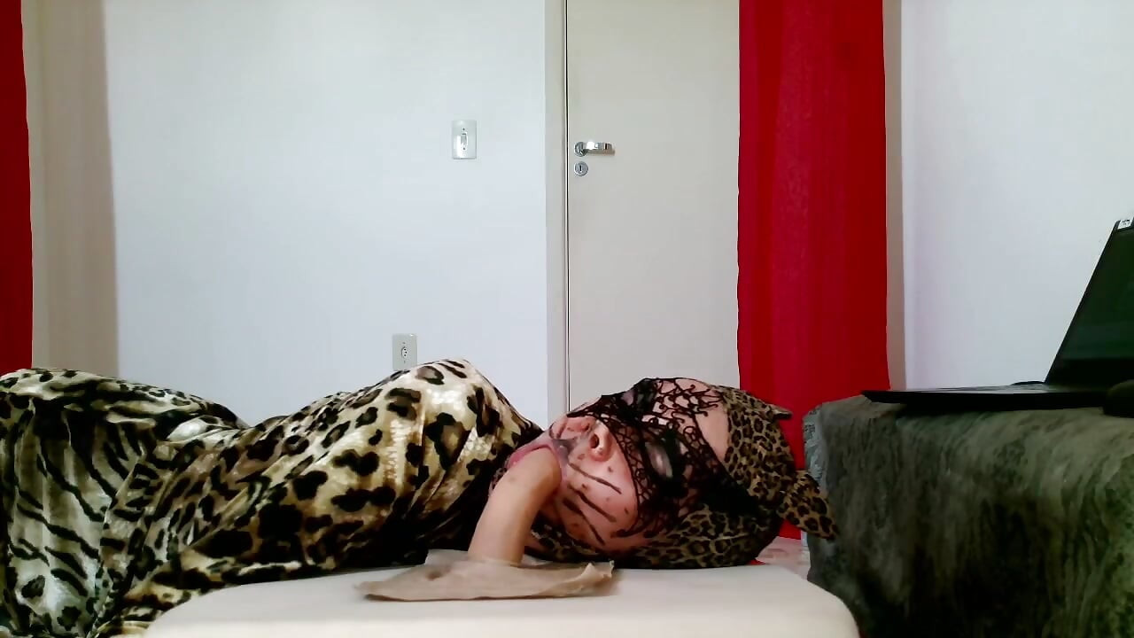 Hungry CatWoman shows how to use tounge on dick