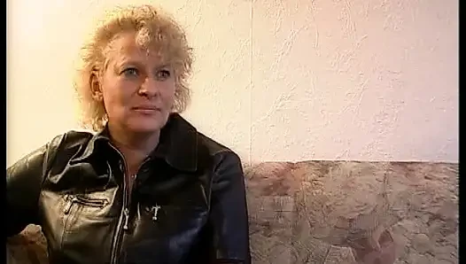Nasty German blonde coguar sucks dick in the living room