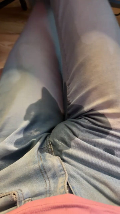 Chasity caged and peeing already pee stained jeans while gaming