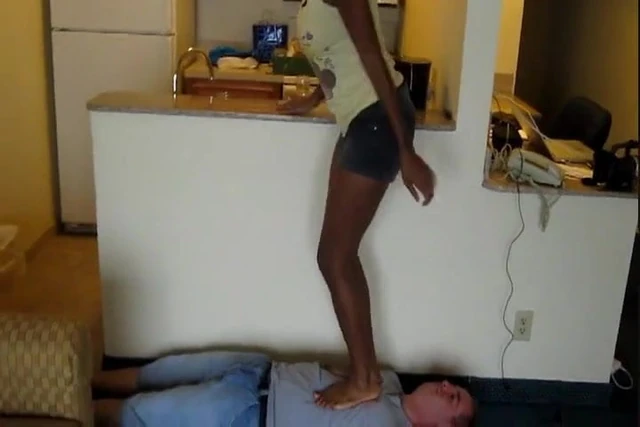 Black Goddess trampling a loser