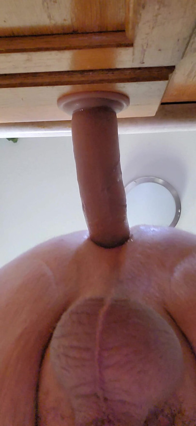 Teasing my hole with a fat toy