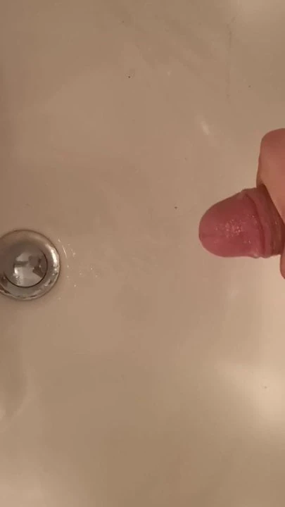 Jerking in bathroom