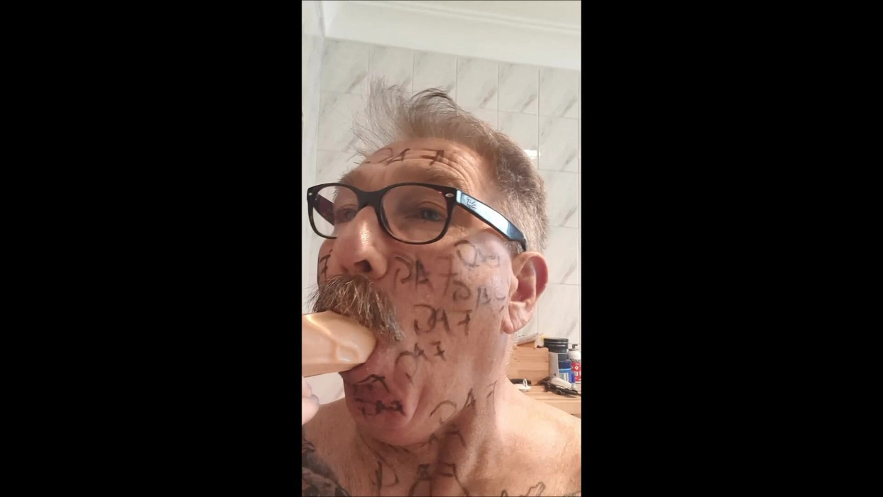 FAGGOT STEVE RYAN PRACTICING SUCKING COCK ON HIS COCK DILDO