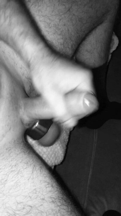 Wanking with ball weight on sofa with lots of cum