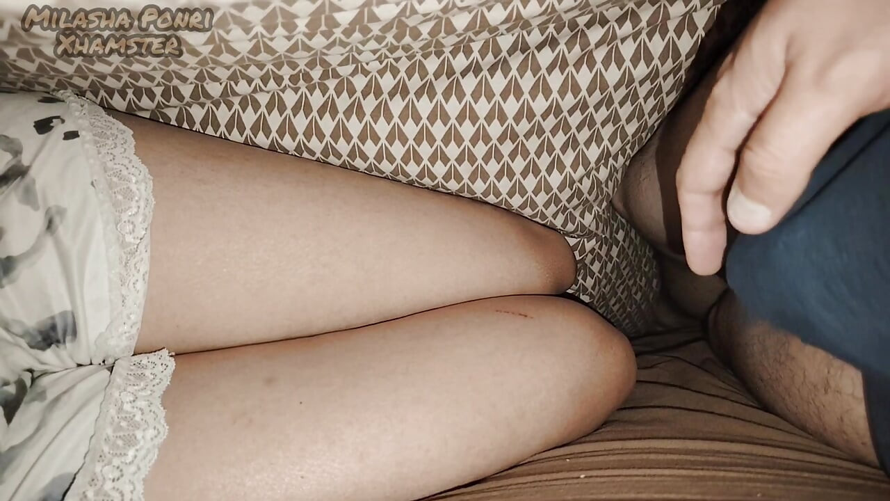 I'm lying next to my stepsister and touching my dick.