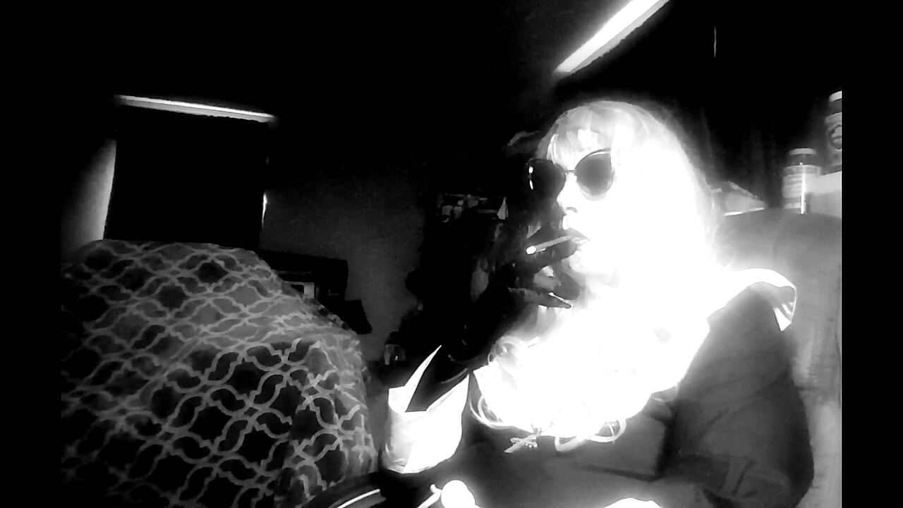 MATURE NUN LOVES TO JERK IT WHILE SMOKING VS120s AT HER COMPUTER DESK CD SISSY TG