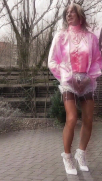 Key moment from "Wanking Sissy In Shiny Satin"