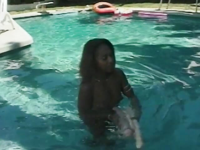 Four sexy ebony babes at poolside muff diving and using dildos to fuck tight twat
