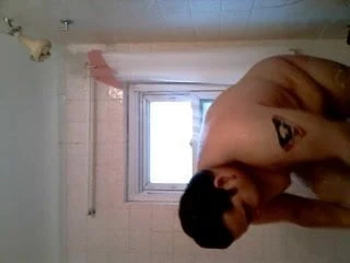 OUR  MAN  TAKING   A SHOWER