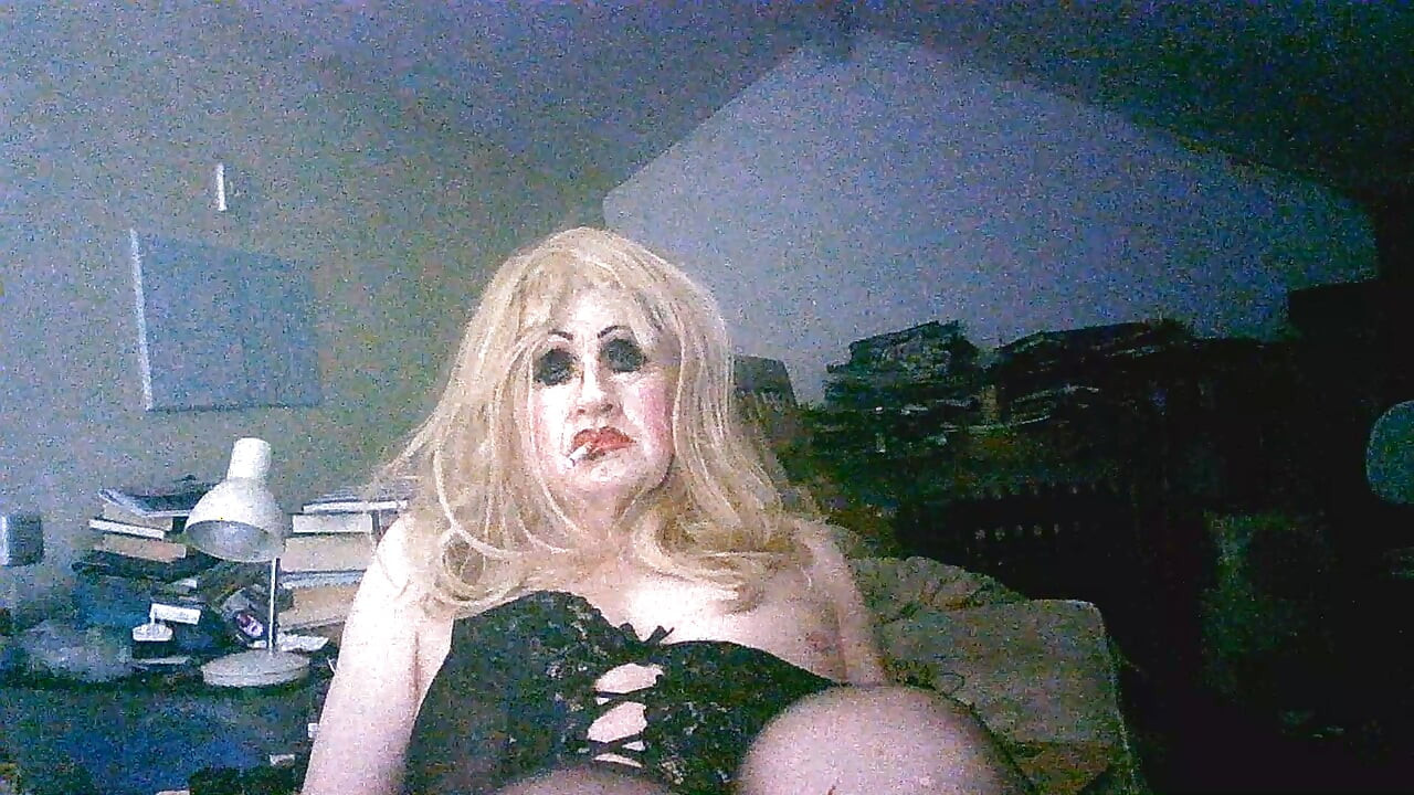 Trashy tranny cumslut Sarah enjoys a smoke after being fucked by random old strangers at a dogging site