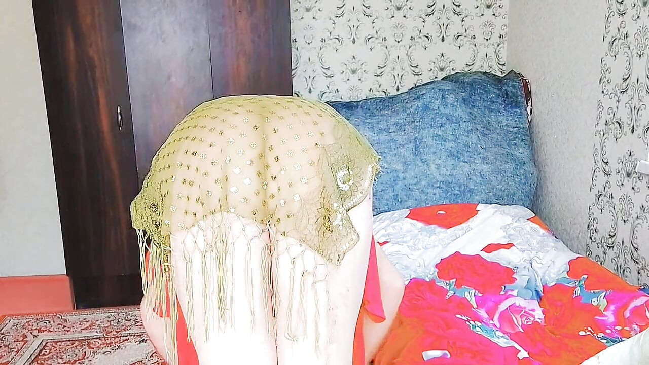 Lovely shemale lying in bed reading cute magazine