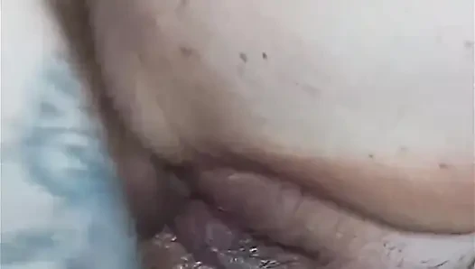 Big hairy pussy close-up gets a bigger cumshot