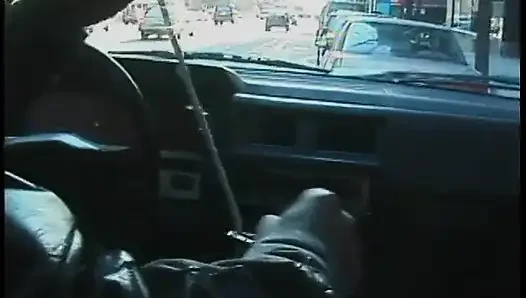 Commuter redhead carpools with creep who debases her in car in city traffic