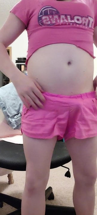 A little tease  in a crop top and shorts 1