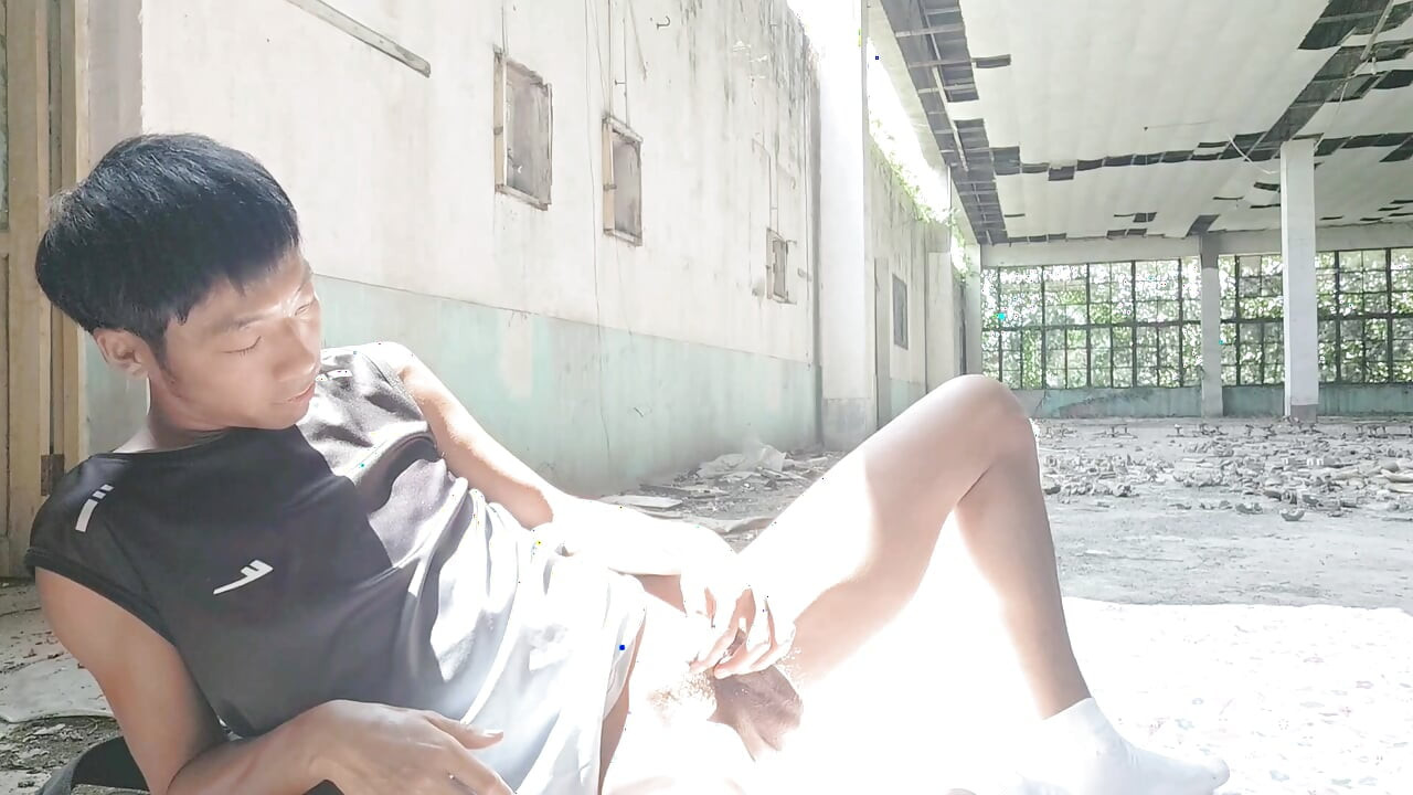 Cute Asian boy masturbates, moaning, ejaculating, and consuming fluids in a dreamlike light and shadow environment
