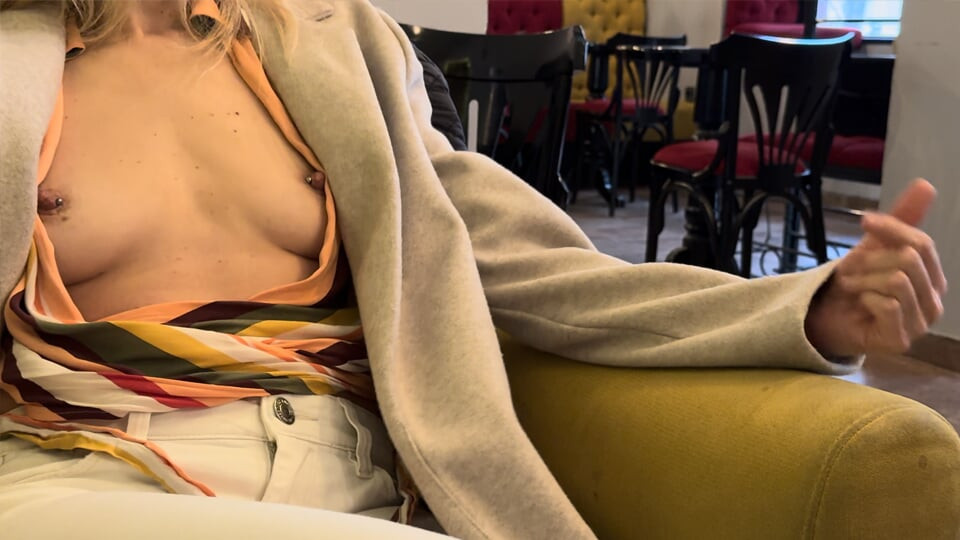 Wife exposing boobs and big pierced nipples while having coffee in a bar public while my husband plays with my boobs
