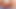 セクシーな女が巨大なペニスが剃った秘部を突き刺す中、快感に喘ぐ