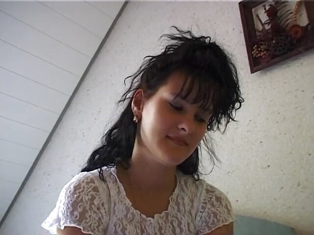 Horny girl lays in bed finger fucking herself and stroking clit