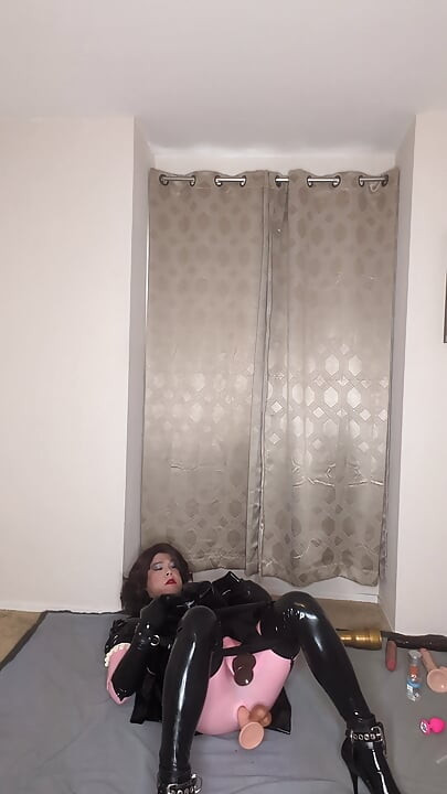 Latex Catsuit and Maid Dress Sissy Tries to Fuck Both of Her Holes with Dildos