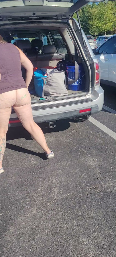Milf Putting Away Groceries While Flashing People In The Parking Lot