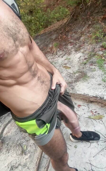 Hairy dad with a huge dick showing off on the trail
