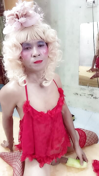 Oanh Le transgender wearing suggestive clothes to play with cans pretending to be too happy