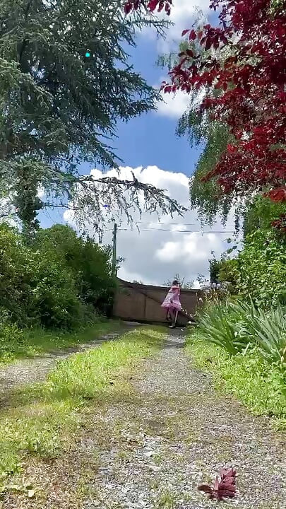 Dressed in her new pink maid outfit for a day